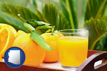orange juice and fresh oranges - with Arizona icon